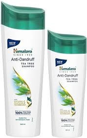 Himalaya Anti-Dandruff Tea Tree Shampoo with a teal cap and a white label featuring tea tree graphics.