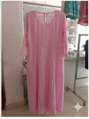 light pink long cotton dress featuring delicate embroidered patterns and a front button placket.