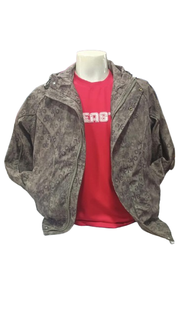 men's streetwear combination consisting of a patterned utility windbreaker layered over a bright graphic crewneck t-shirt.