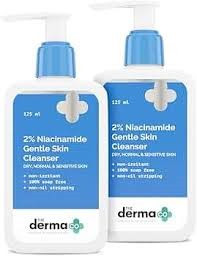 The Derma Co 2% Niacinamide Oily-Skin Cleanser (125 ml) appears to be a white pump bottle featuring a blue label.