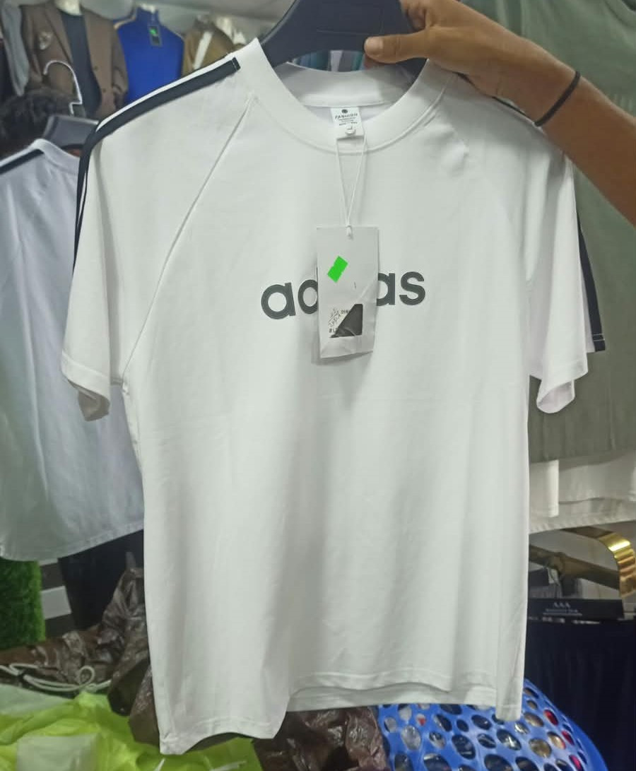 white Adidas 3-Stripes t-shirt featuring black signature stripes along the shoulders and a small central logo on the chest.