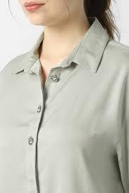 women's collared blouse with a subtly textured fabric