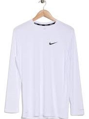 white Nike long-sleeve athletic top featuring a small black Swoosh logo on the chest and a red-and-blue striped trim inside the collar