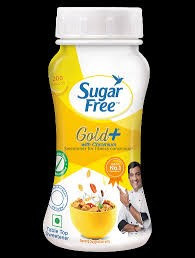 Sugar Free Gold Low Calorie Sweetener powder by Zydus, featuring a white cap and a yellow and white labe